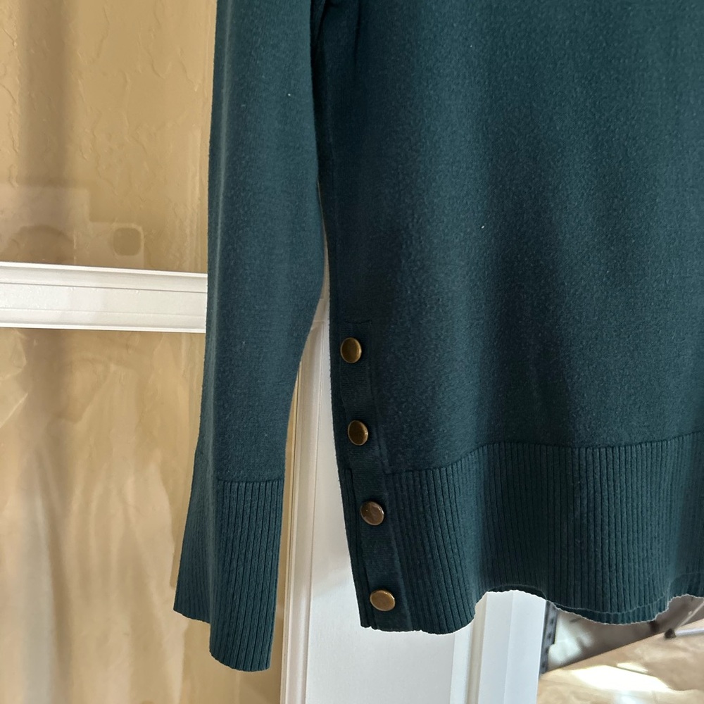 Stretch quarter length sleeve sweater with button detail